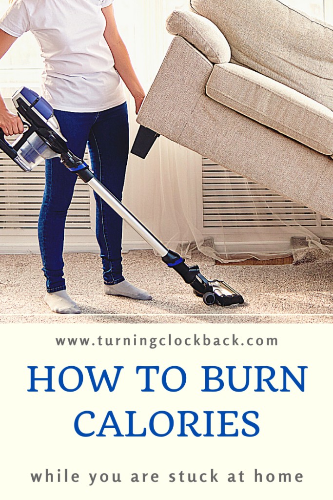 woman vacuuming while lifting couch with one hand and text overlay 'How to Burn Calories while you are stuck at home'