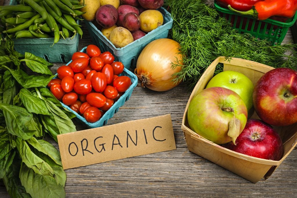 organic produce from a farmers market on a wooden table