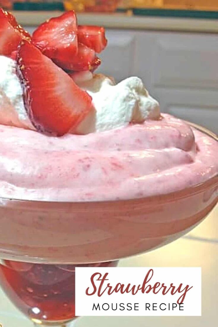 homemade strawberry mousse with fresh strawberries in a wine glass