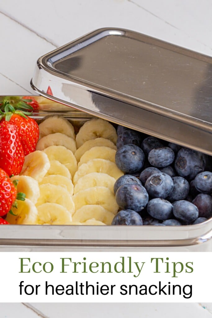 small pieces of fruit in a metal tin to indicate green snack routine