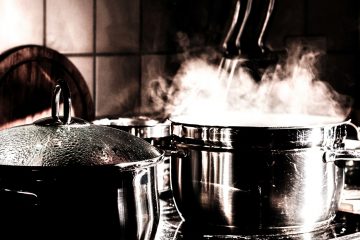 pot simmering on stove to indicate hot kitchen