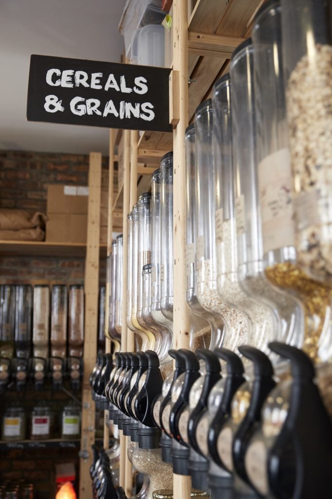 Dispensers For Cereals And Grains In Sustainable Plastic Free Grocery Store