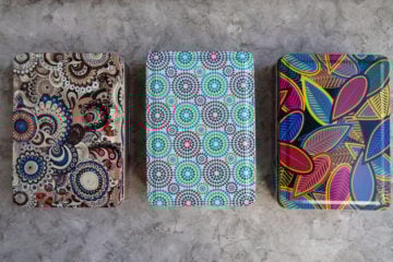 Multi-colored metal boxes. Boxes for little things. Gift boxes