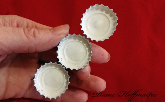 Try this Eco Friendly Christmas Craft: Bottle Cap Snowmen!