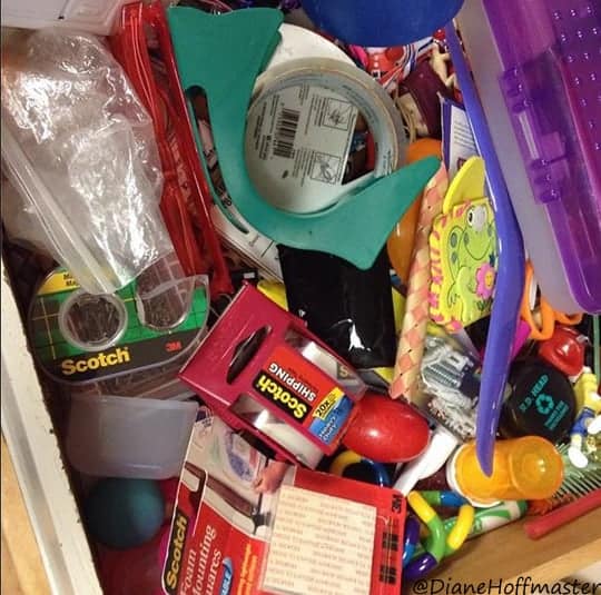 messy junk drawer needing to be organized