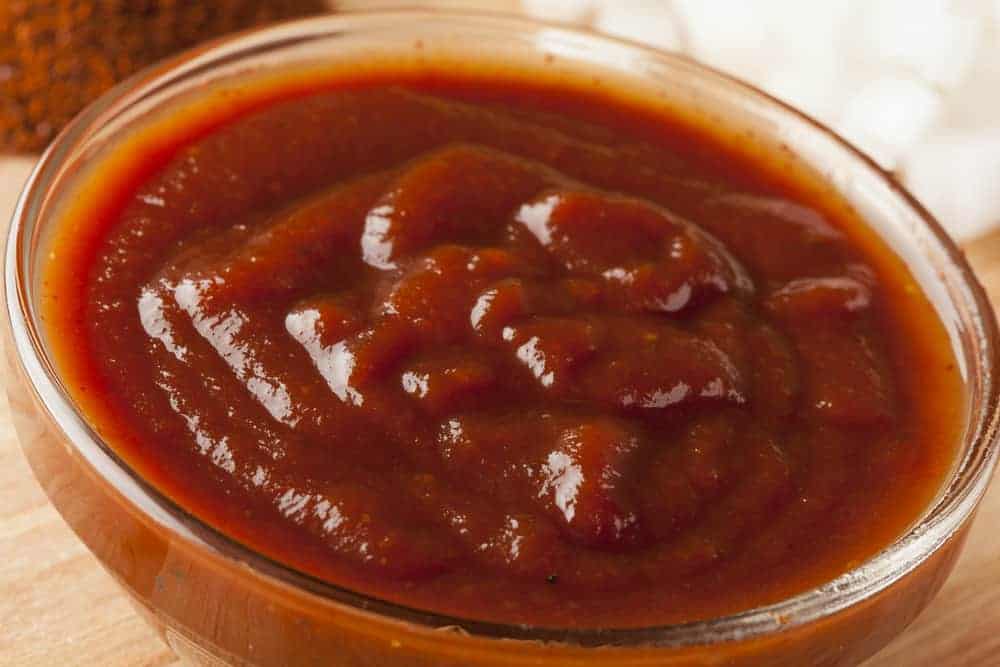 Spicy Homemade Barbecue Sauce with onions and seasoning