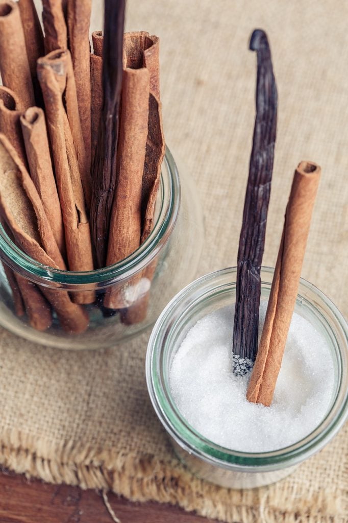 cinnamon and sugar in small spice container with vanilla