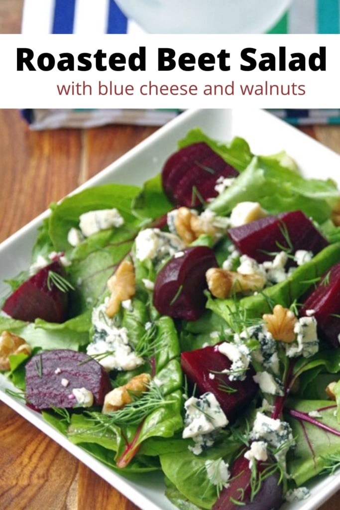 Roasted Beet Salad with blue cheese and walnuts on a white plate