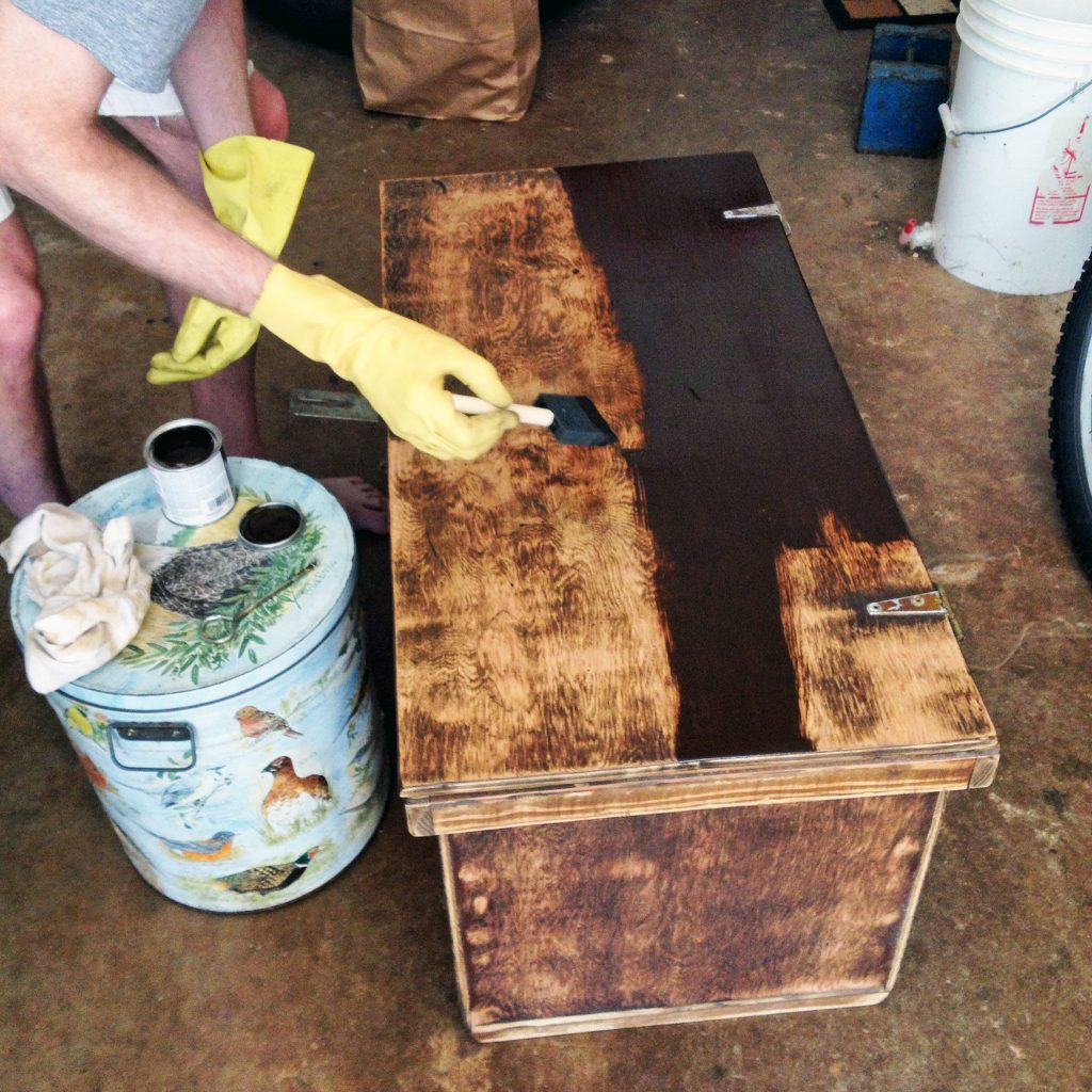 close up of linen chest being painted