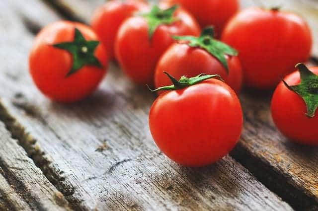 cherry tomatoes on a wooden table