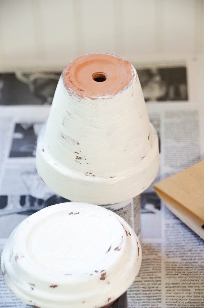 clay pot being painted