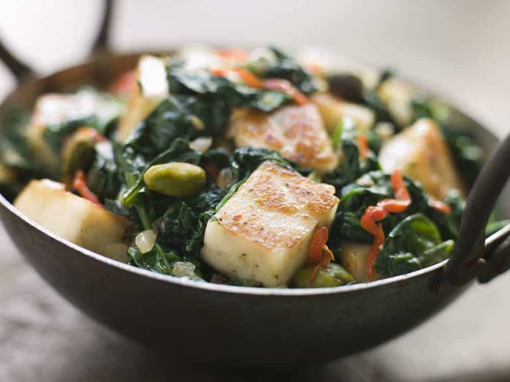 Close up image of Karai Dish with Spinach and fried Paneer