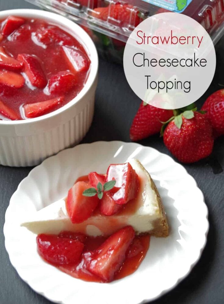 cheesecake on plate with fresh strawberry topping on it