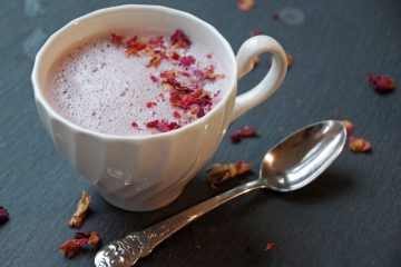 Tart Cherry Moon Milk in white mug with dried rose petals