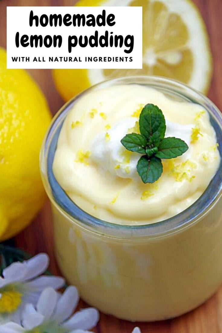 homemade lemon pudding in a glass jar with fresh lemons behind it