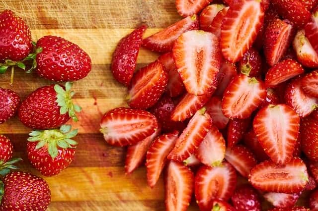 strawberries on cutting board