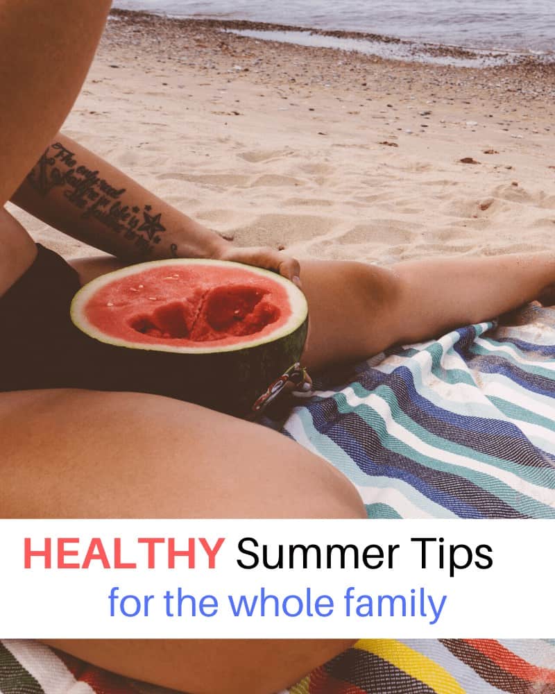 close up of woman eating watermelon on the beach with text overlay 'HEALTHY Summer Tips for the whole family'