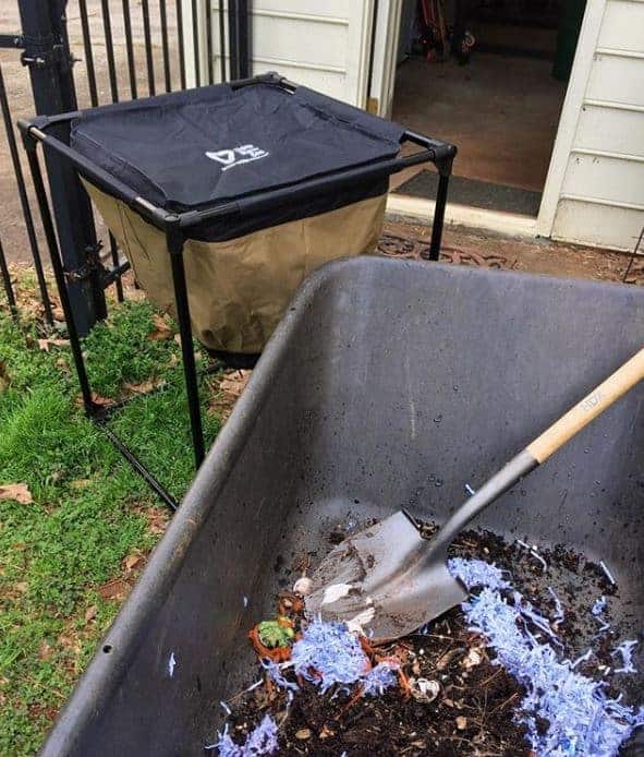 wheelbarrow full of compost and setting up a worm bin