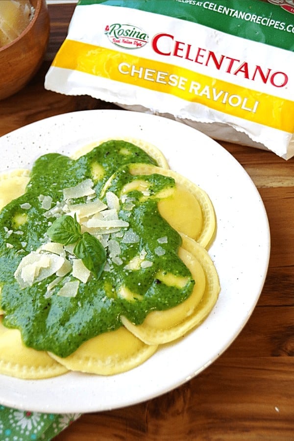 Celentano cheese ravioli with creamy spinach pasta sauce with Parmesan cheese and fresh basil