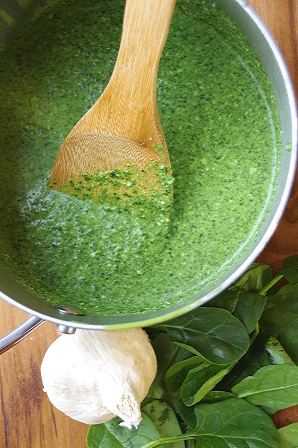 Spinach pasta sauce ingredients in pan