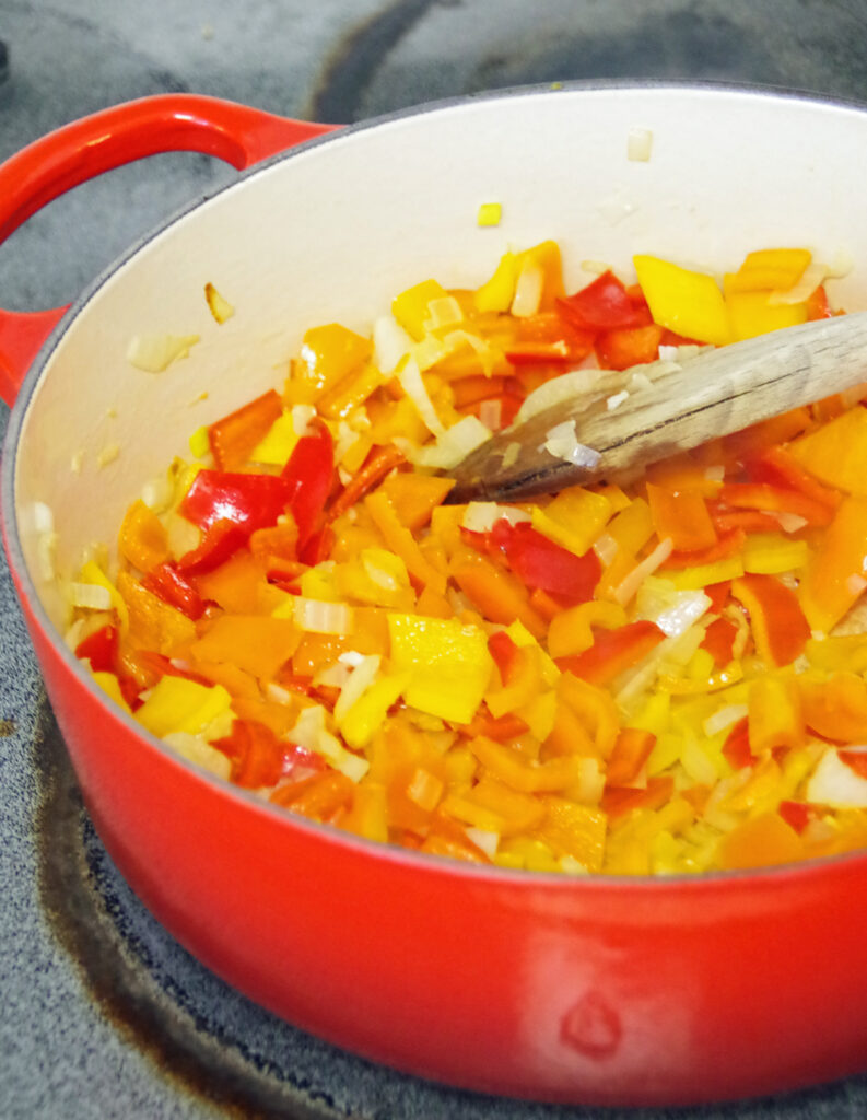 diced bell peppers in pan